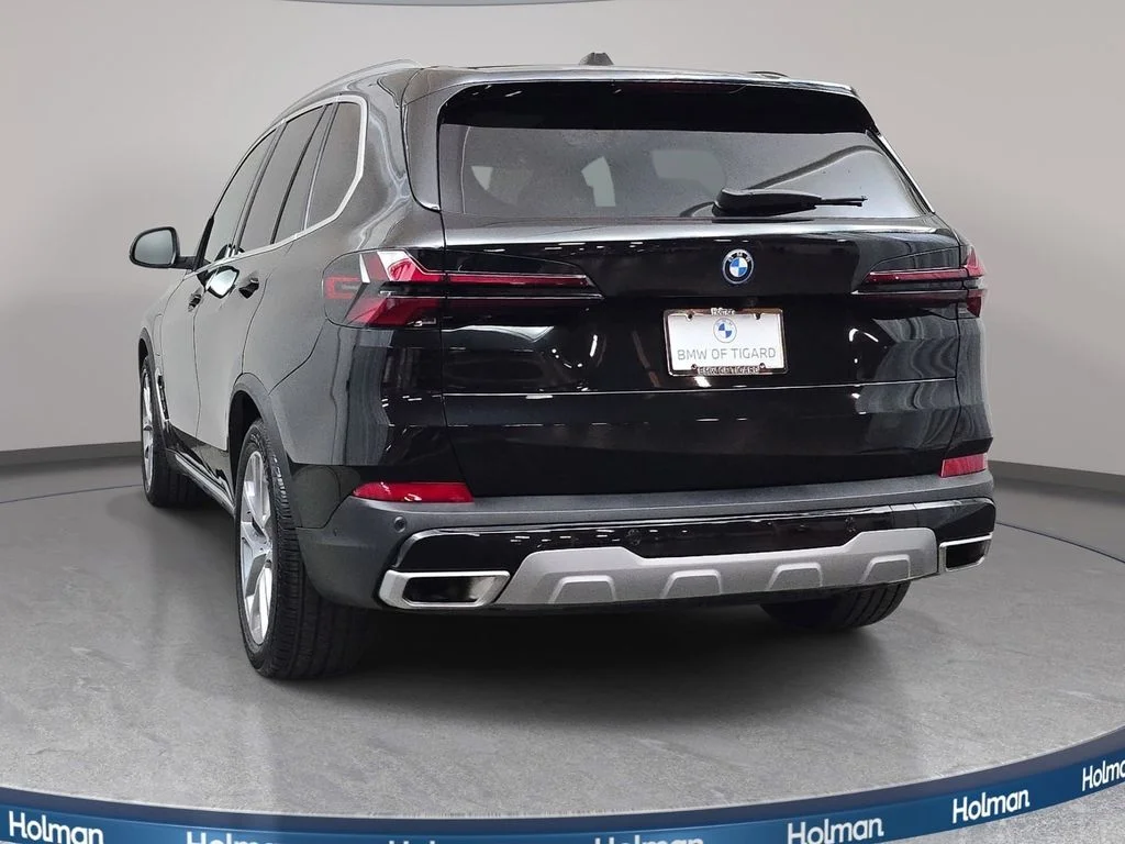 Used 2025 Black Sapphire Metallic BMW xDrive50e image 7