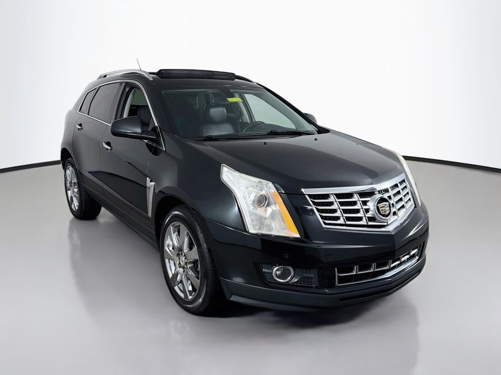 Used 2013 Black Ice Metallic Cadillac Performance Collection image 1