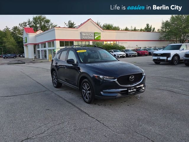 Used 2018 Crystal Blue Mazda Touring image 1