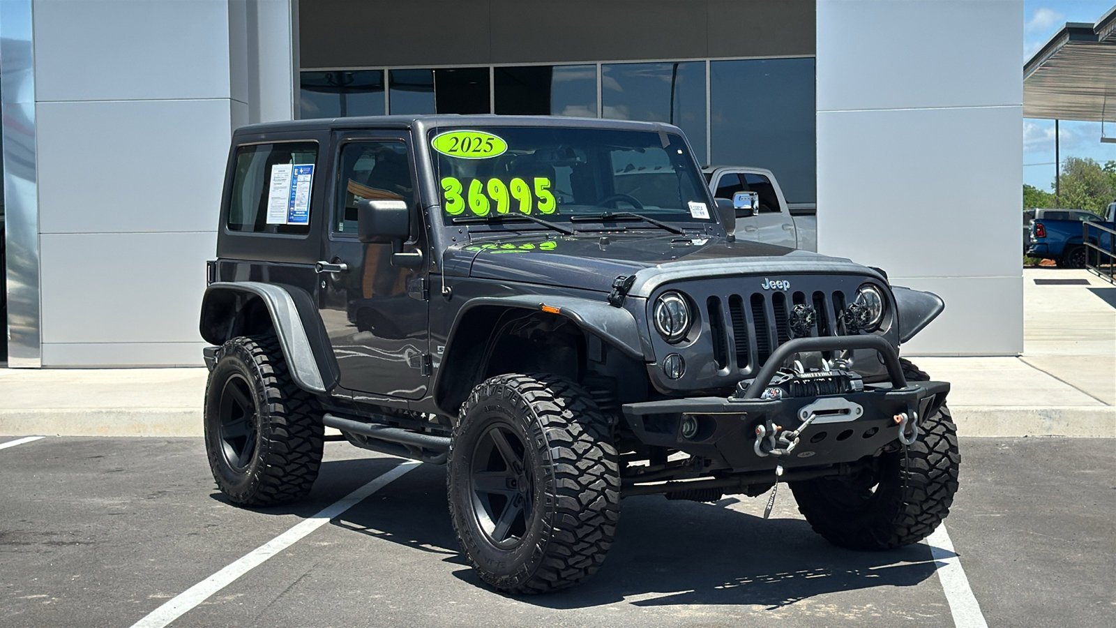Used 2014 Granite Crystal Metallic Clearcoat Jeep Sport image 7