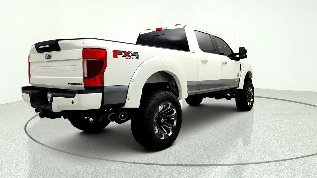 Used 2022 Star White Metallic Tri-Coat Ford Black Widow LARIAT 4WD Crew Cab 6.75