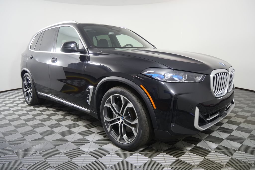 New 2026 Black Sapphire Metallic BMW xDrive50e image 2