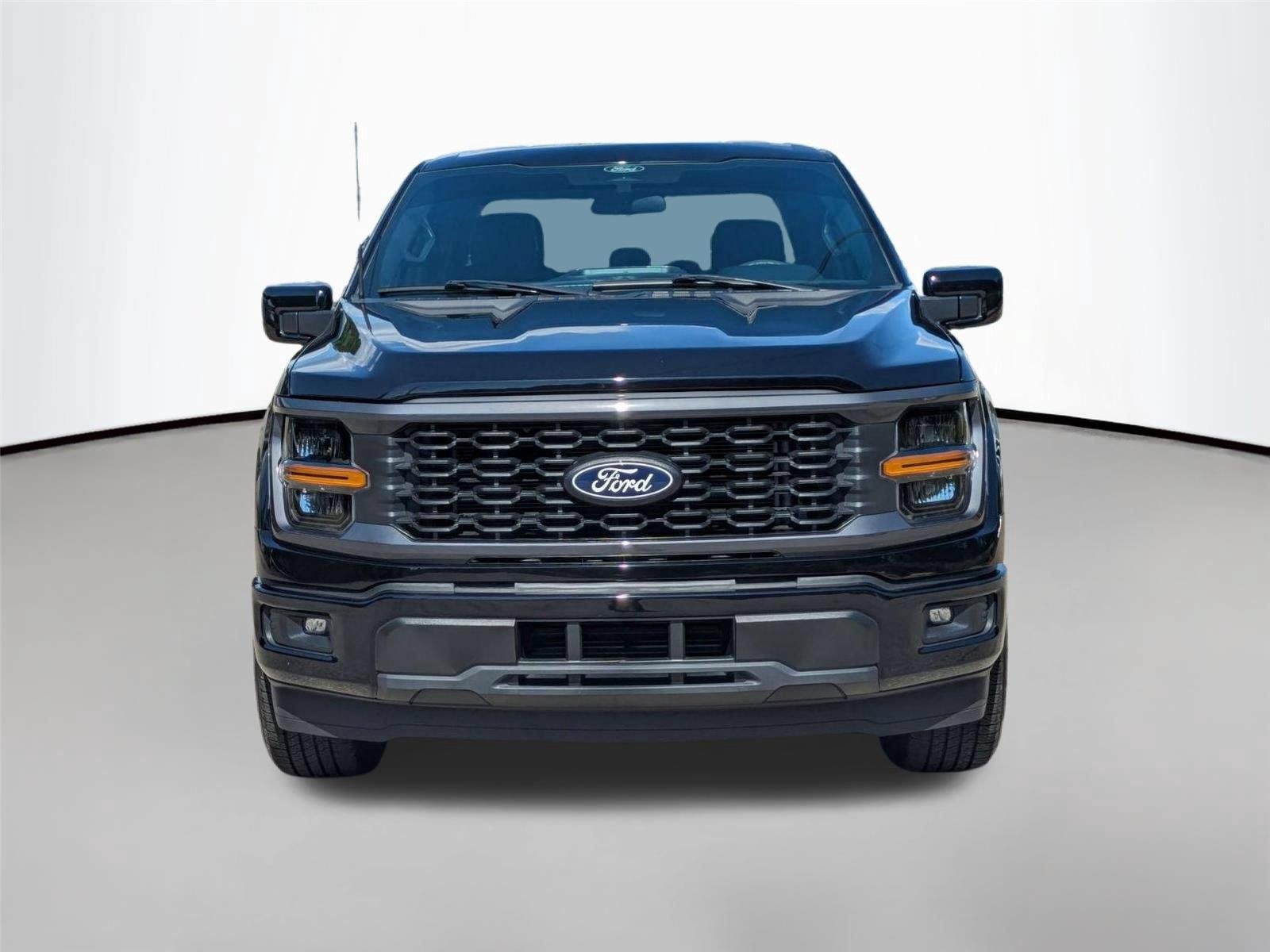 Used 2025 Agate Black Metallic Ford STX image 2
