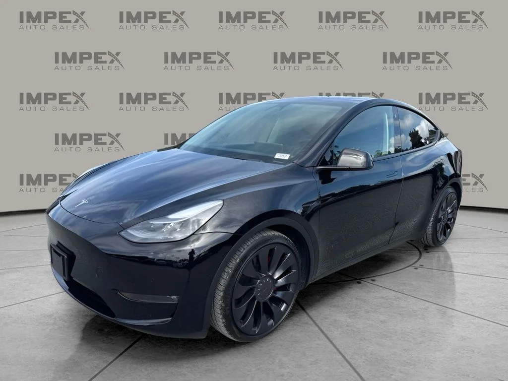 Used 2022 Black Tesla Performance image 1