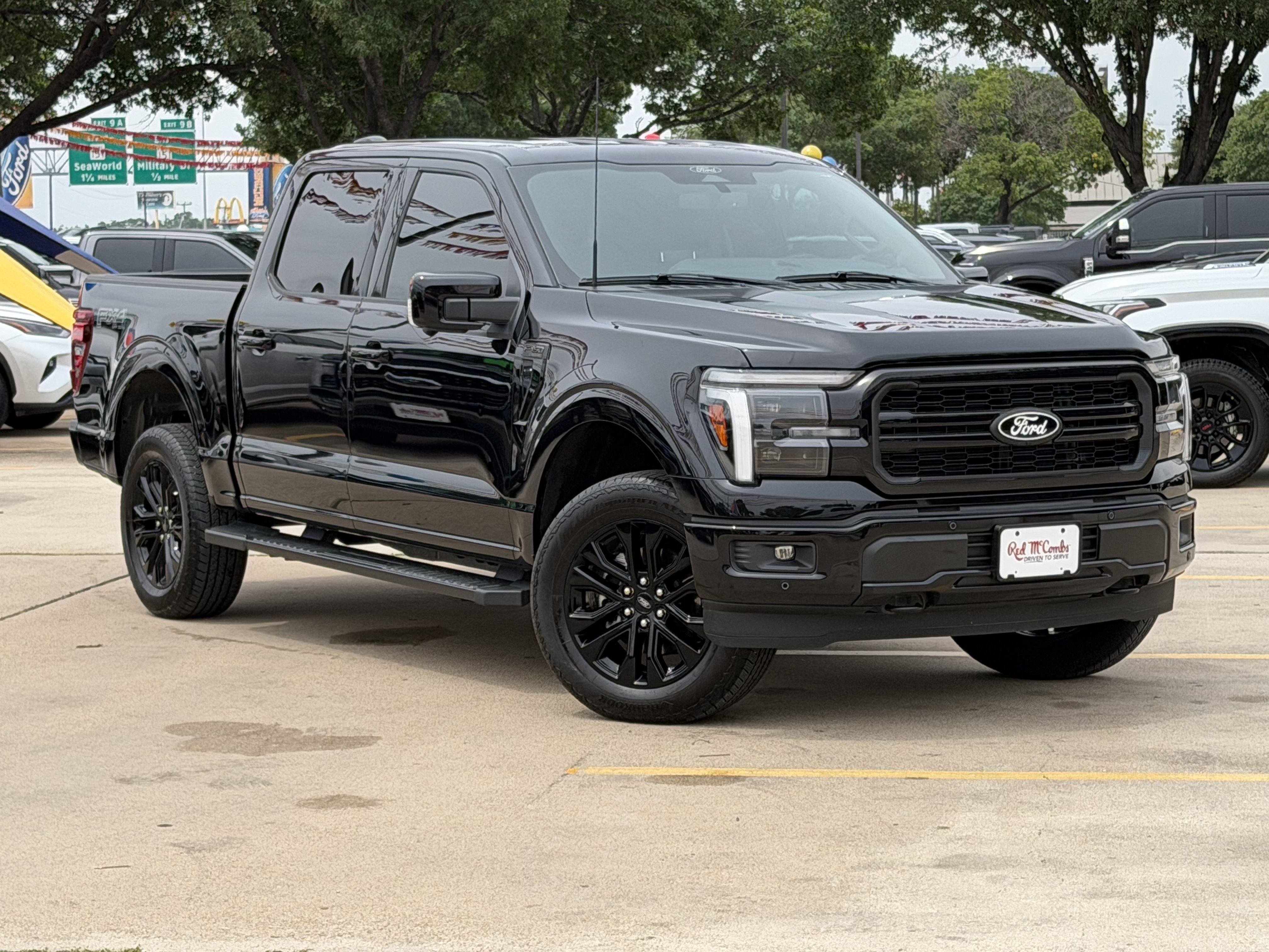 Used 2025 Agate Black Metallic Ford Lariat image 1