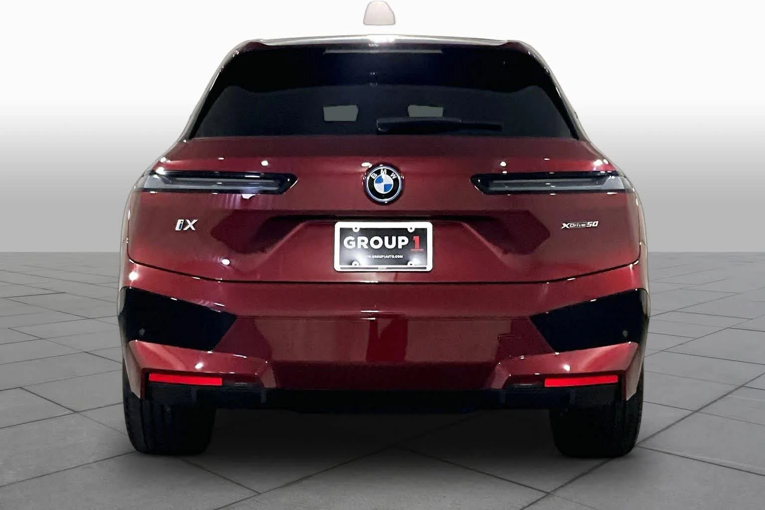 Used 2024 Aventurin Red Metallic BMW xDrive50 image 4