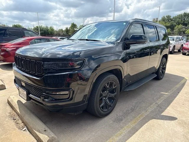 Used 2024 Black Jeep Series II image 1