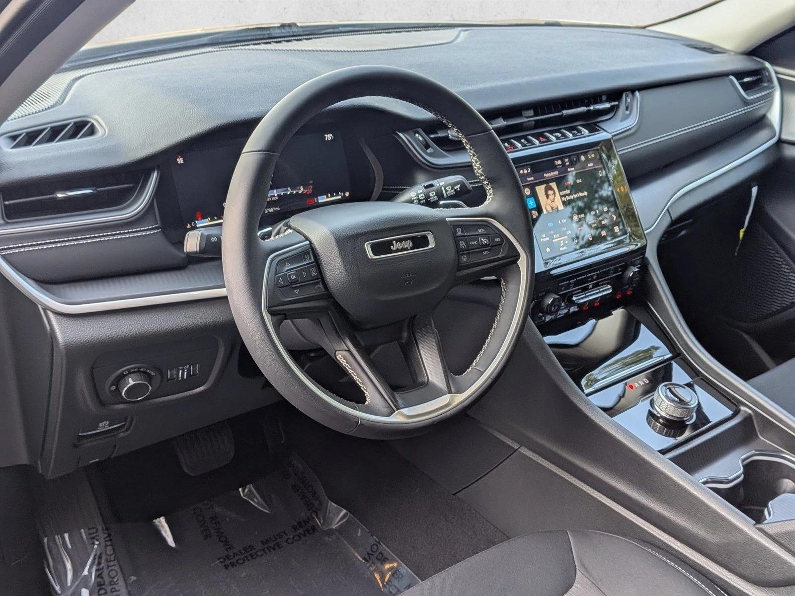 Used 2023 Baltic Gray Metallic Clearcoat Jeep Laredo image 10