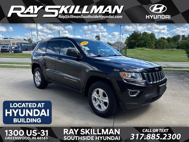 Used 2014 Black Jeep Laredo image 1