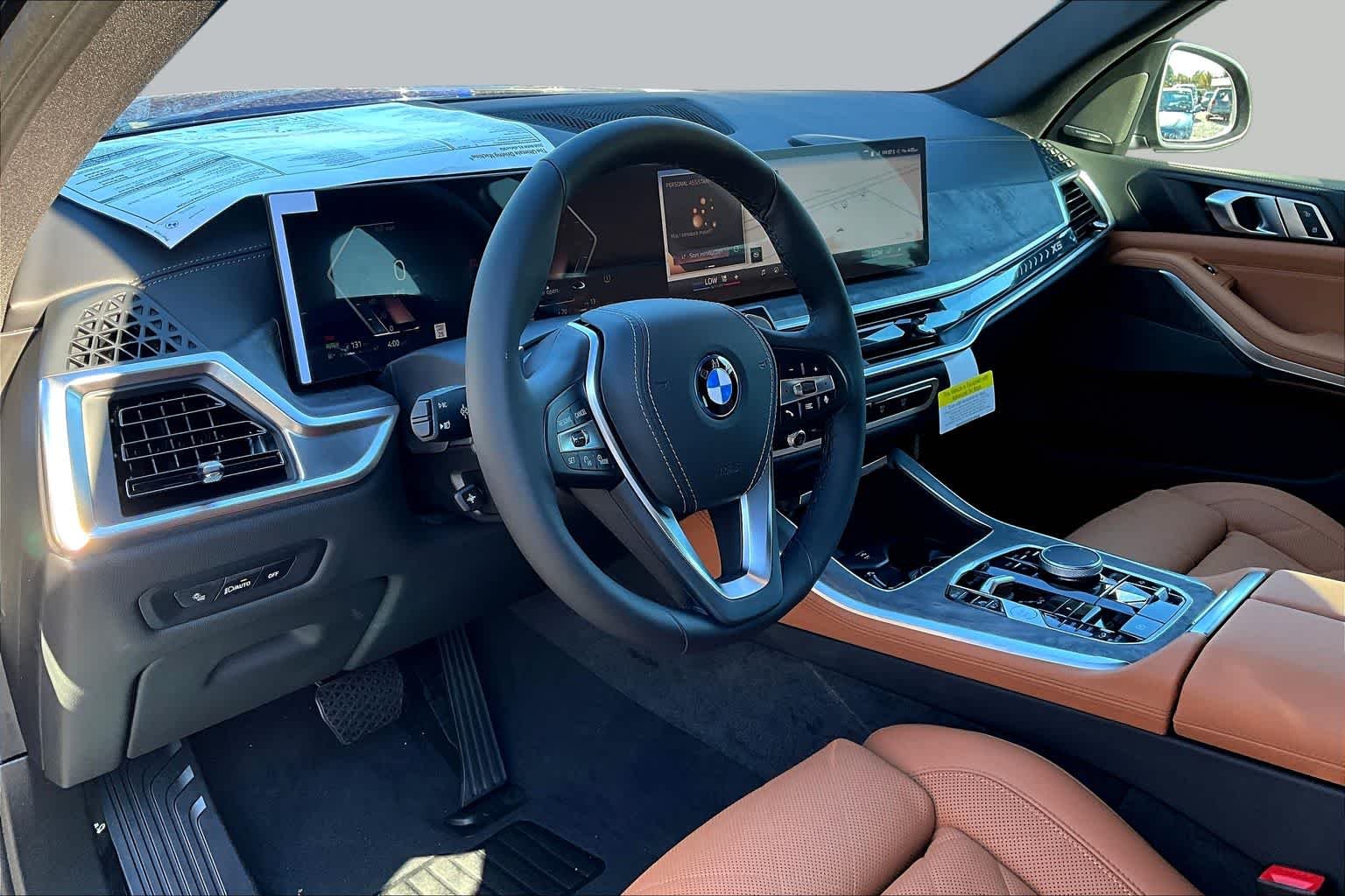 New 2026 Black Sapphire Metallic BMW xDrive50e image 8