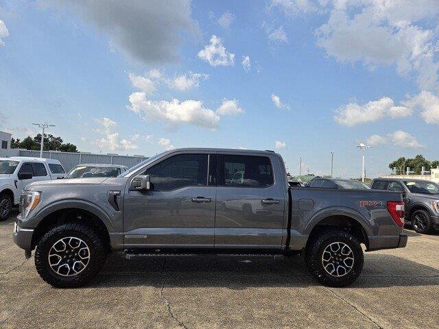 Used 2022 Carbonized Gray Metallic Ford LARIAT image 2