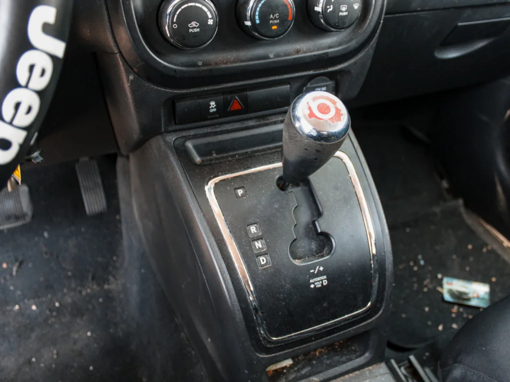 Used 2012 Bright Silver Metallic Clearcoat Jeep Sport image 17