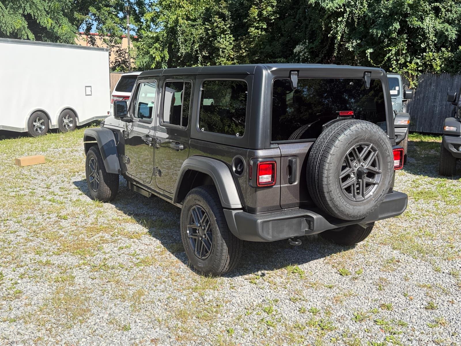 New 2026 Granite Crystal Metallic Clear-Coat Exterior Paint Jeep Sport S 4 Door 4x4 image 3