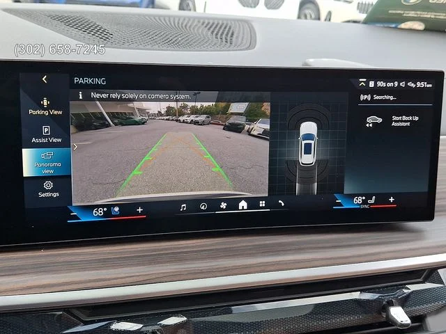 Certified Used 2025 Mineral White Metallic BMW xDrive50e image 18