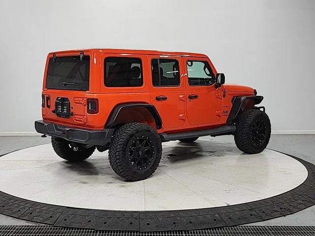 Used 2018 Orange Jeep Unlimited Sahara image 7