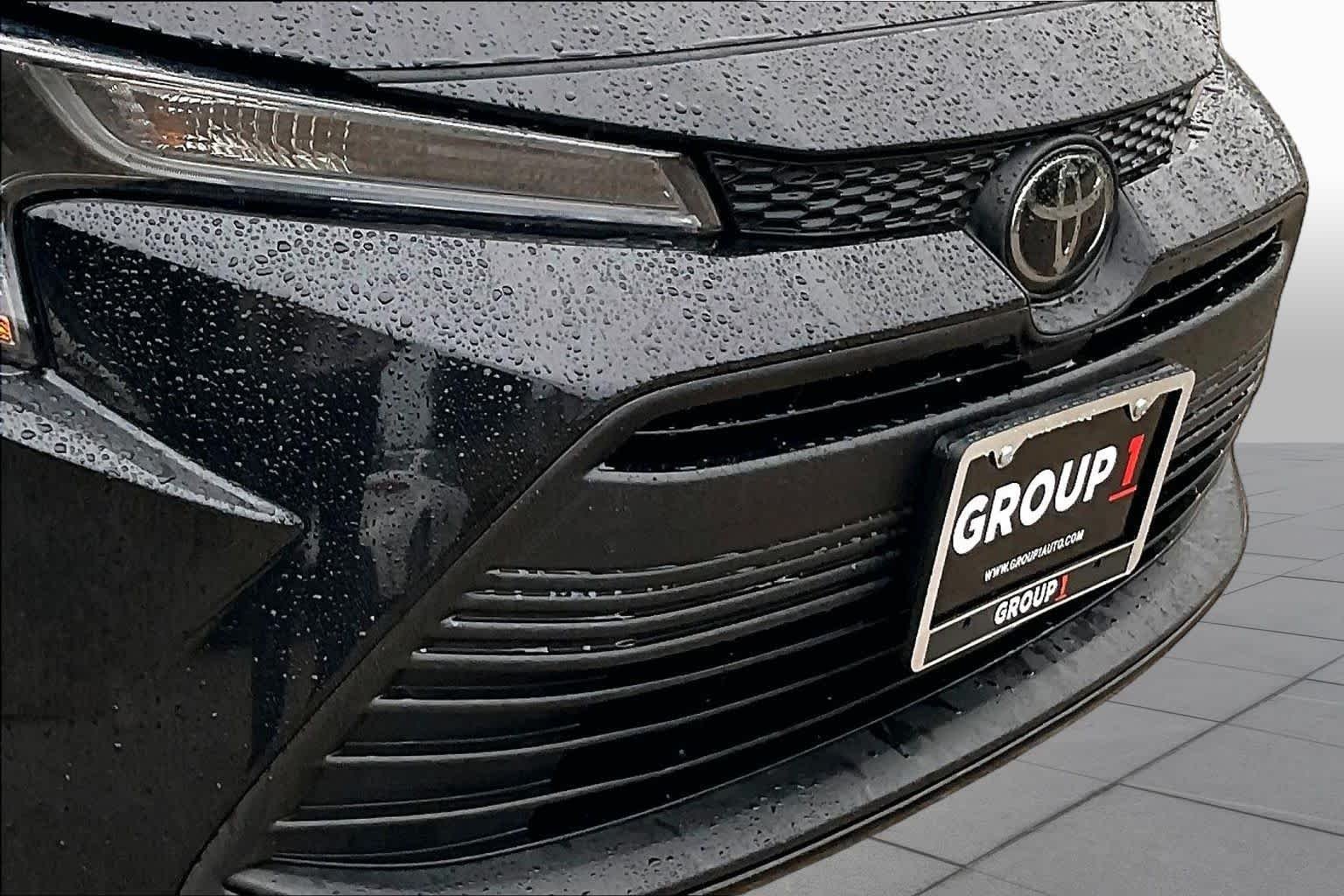 Used 2024 Midnight Black Metallic Toyota LE image 29