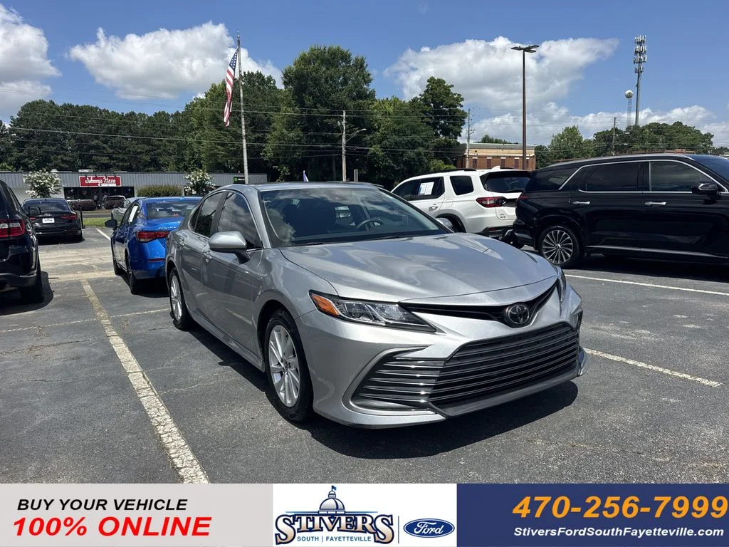 Used 2023 Silver Toyota LE image 1