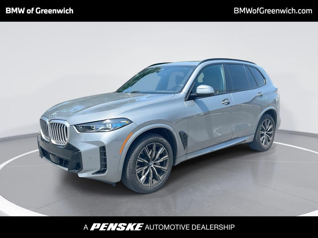 Certified Used 2024 Gray Metallic BMW xDrive40i image 1