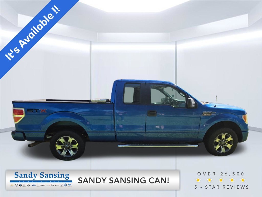 Used 2013 Blue Ford STX image 1