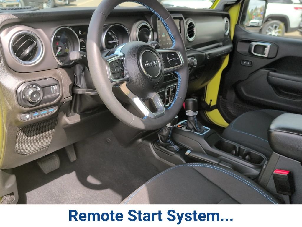 Certified Used 2023 Yellow Jeep Rubicon 4xe image 14