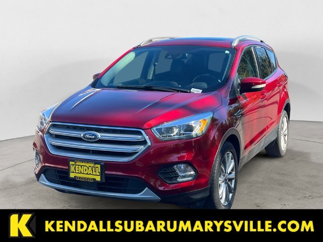 Used 2018 Ruby Red Metallic Ford Titanium image 1