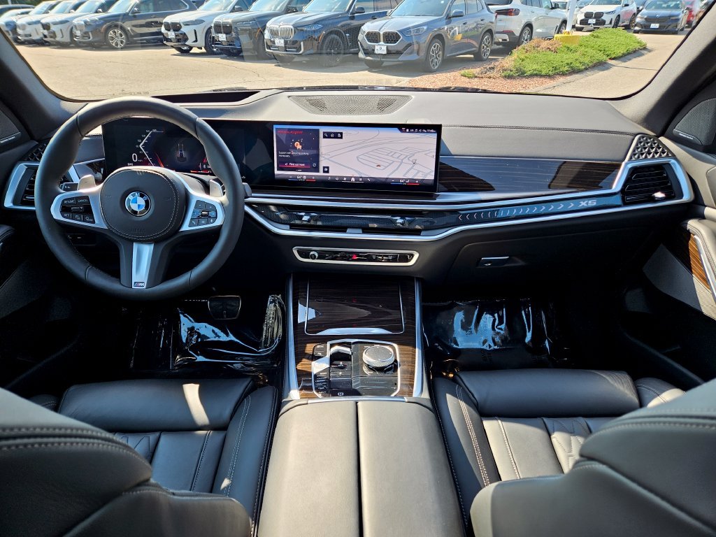 Certified Used 2025 Carbon Black Metallic BMW xDrive40i image 25