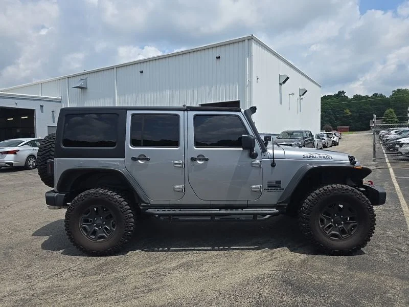 Used 2014 Gray Jeep Unlimited Sport image 9