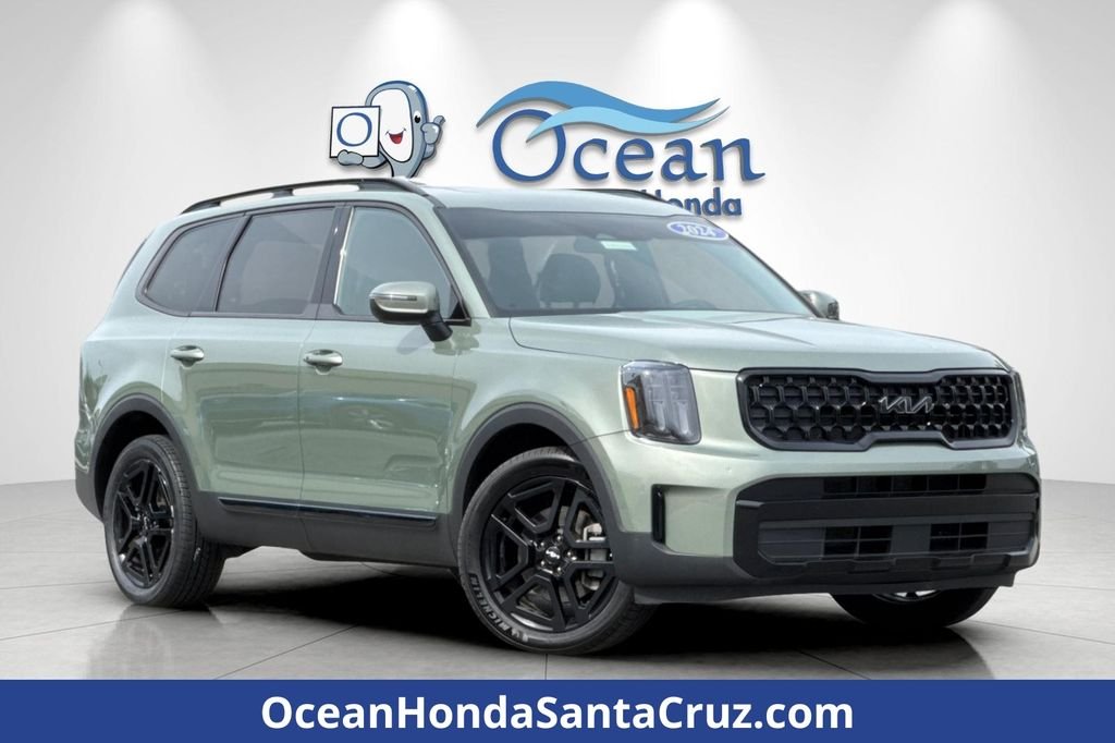 Used 2024 Jungle Green Kia EX X-Line image 1