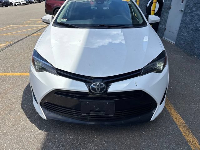 Used 2017 Super White Toyota LE image 2