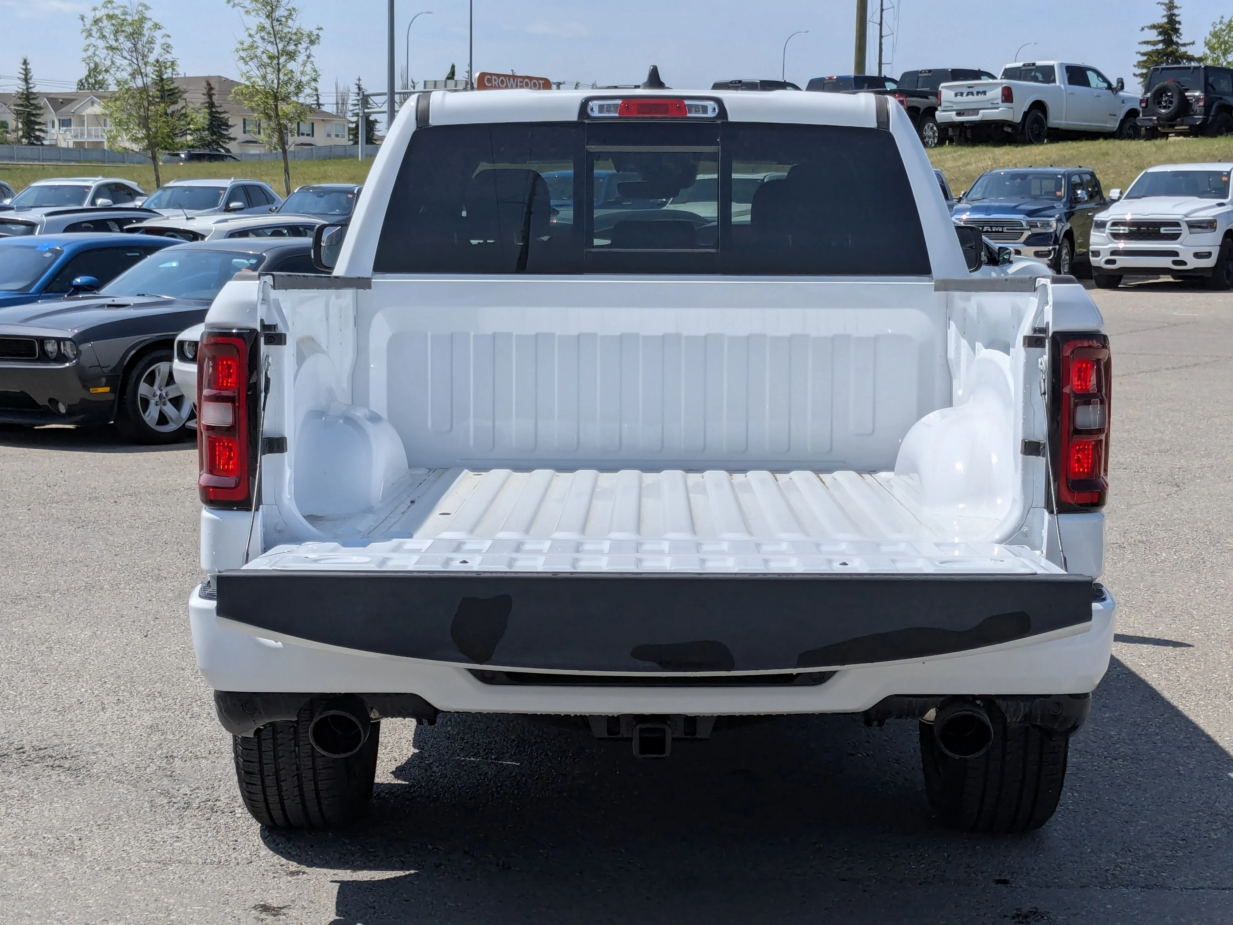 New 2026 White RAM Sport - 3.92 Rear Axle Ratio - Anti Spin Rear Diff - Sport Hood - Panoramic Sunroof & Tons More! image 6