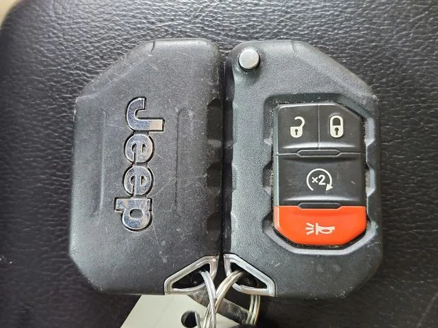 Used 2018 Orange Jeep Unlimited Sahara image 37