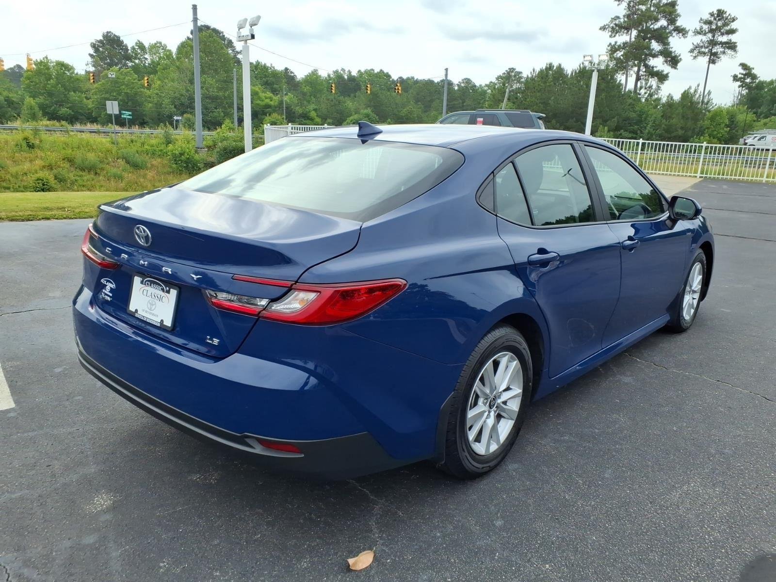 Used 2025 Reservoir Blue Toyota LE image 2