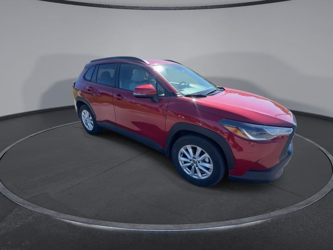 Used 2023 Barcelona Red Metallic Toyota LE image 2