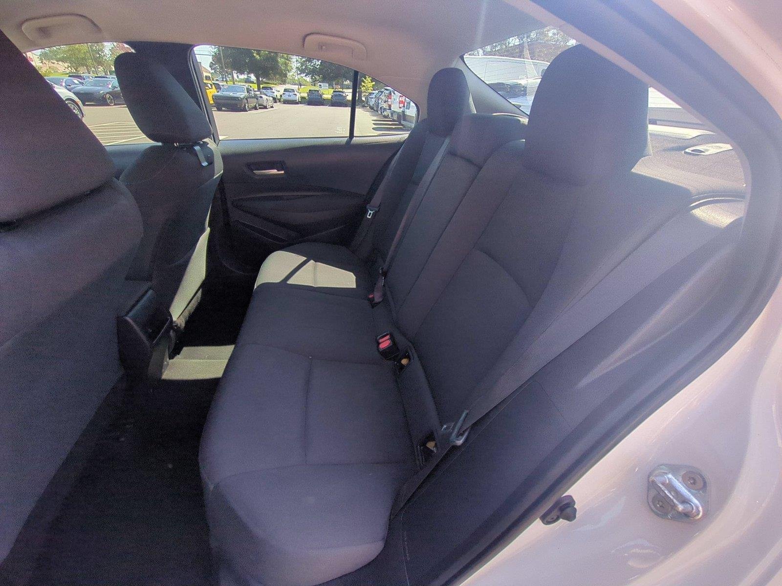Used 2021 Super White Toyota LE image 29