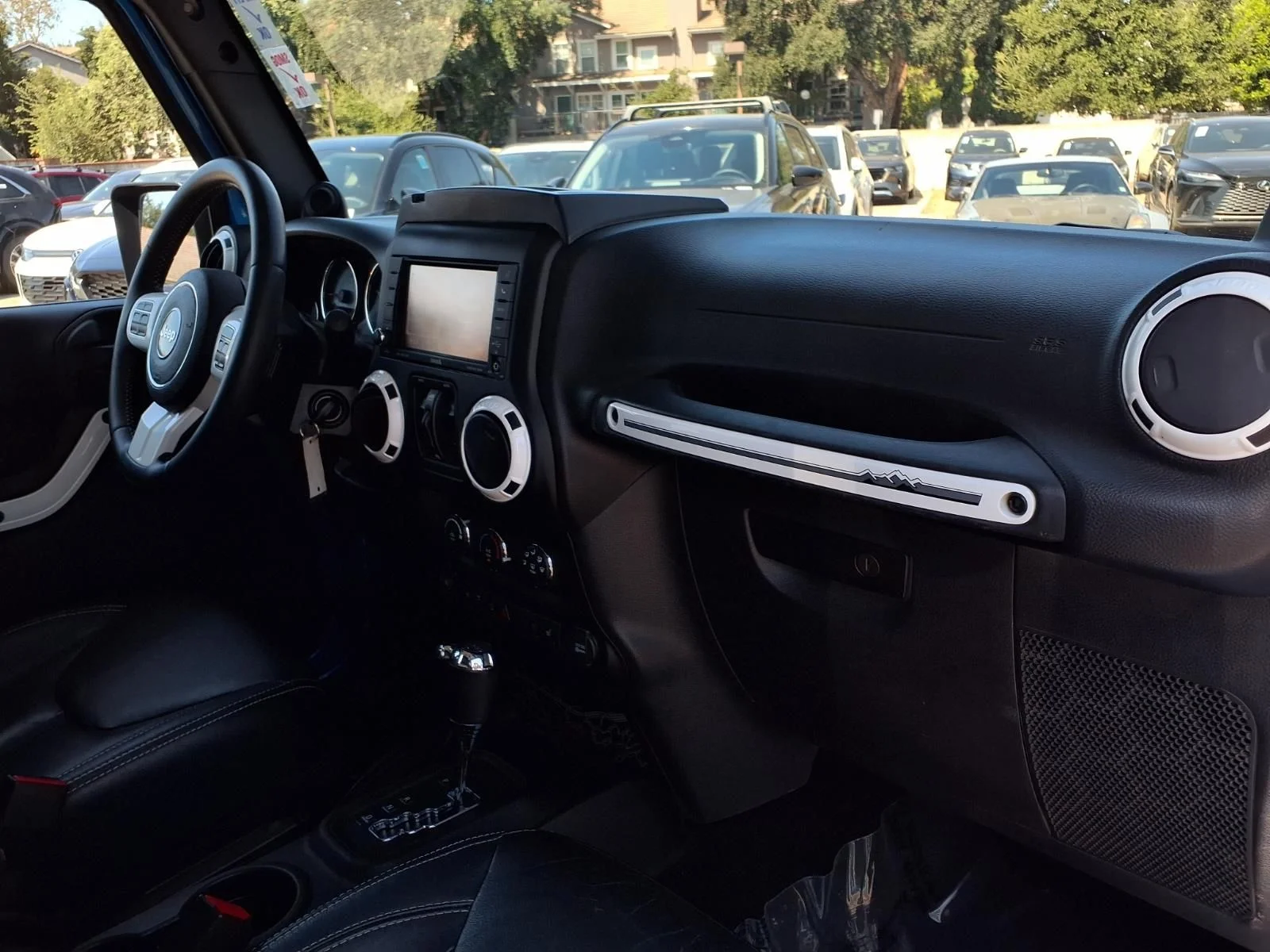 Used 2014 Blue Jeep Unlimited Sahara image 23