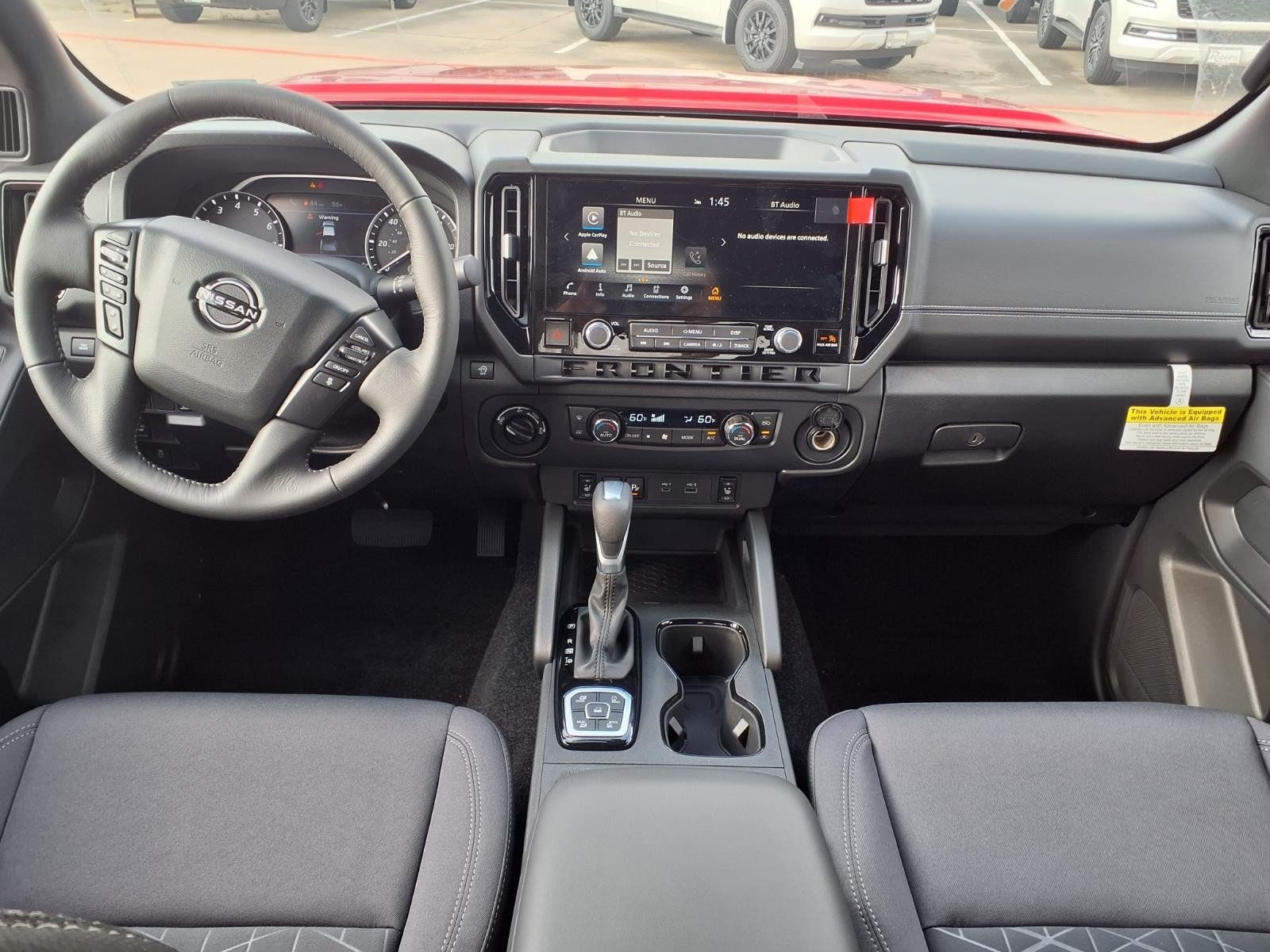 2026 Nissan Frontier SV Red at Robbins Nissan