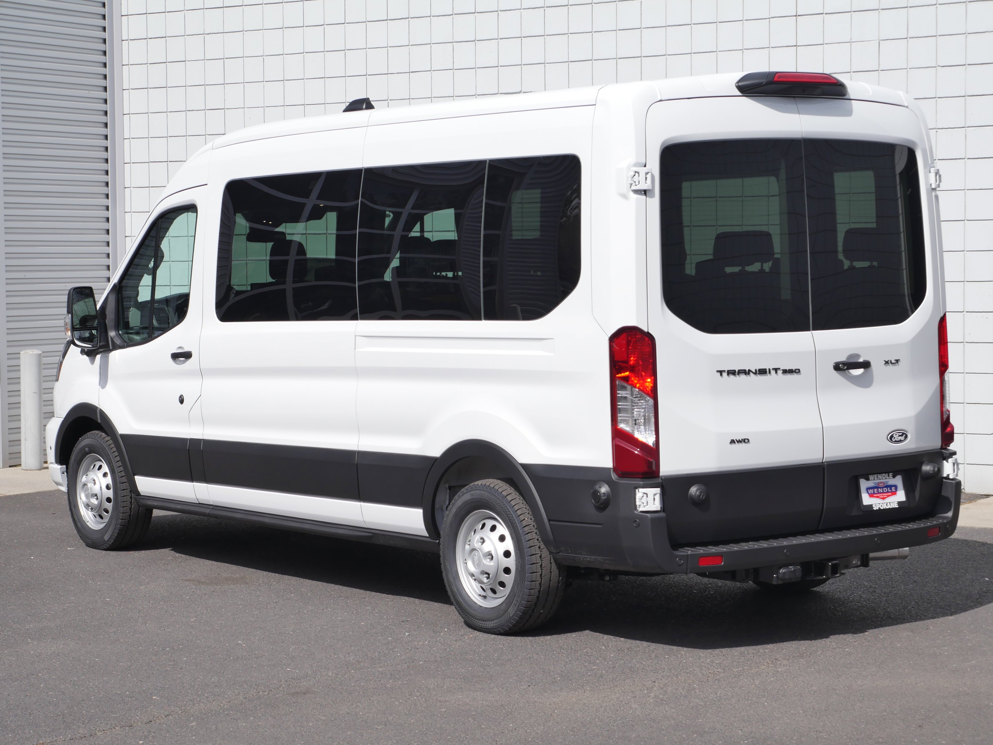 New 2026 Oxford White Ford Passenger Van XLT image 17