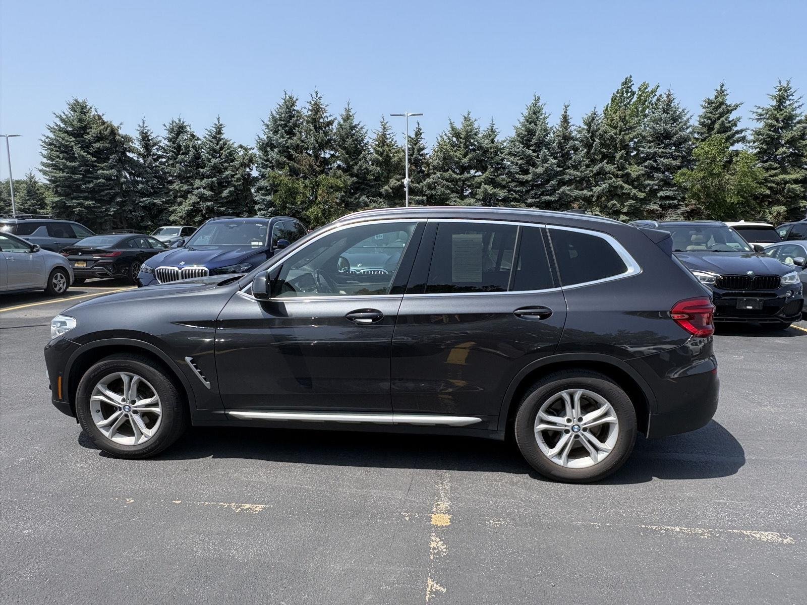 Used 2021 Dark Graphite Metallic BMW xDrive30i image 4