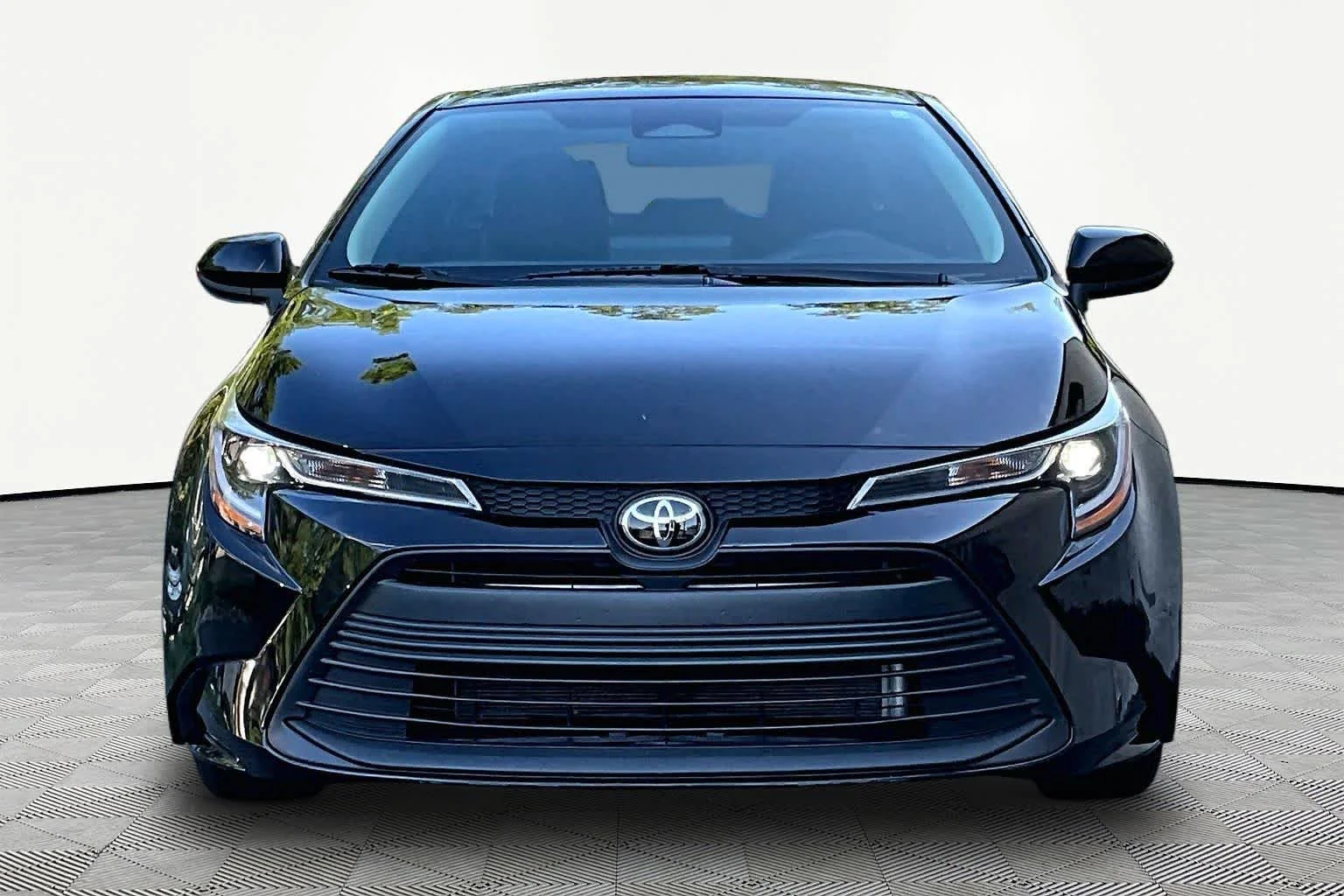 Used 2025 Midnight Black Metallic Toyota LE image 7