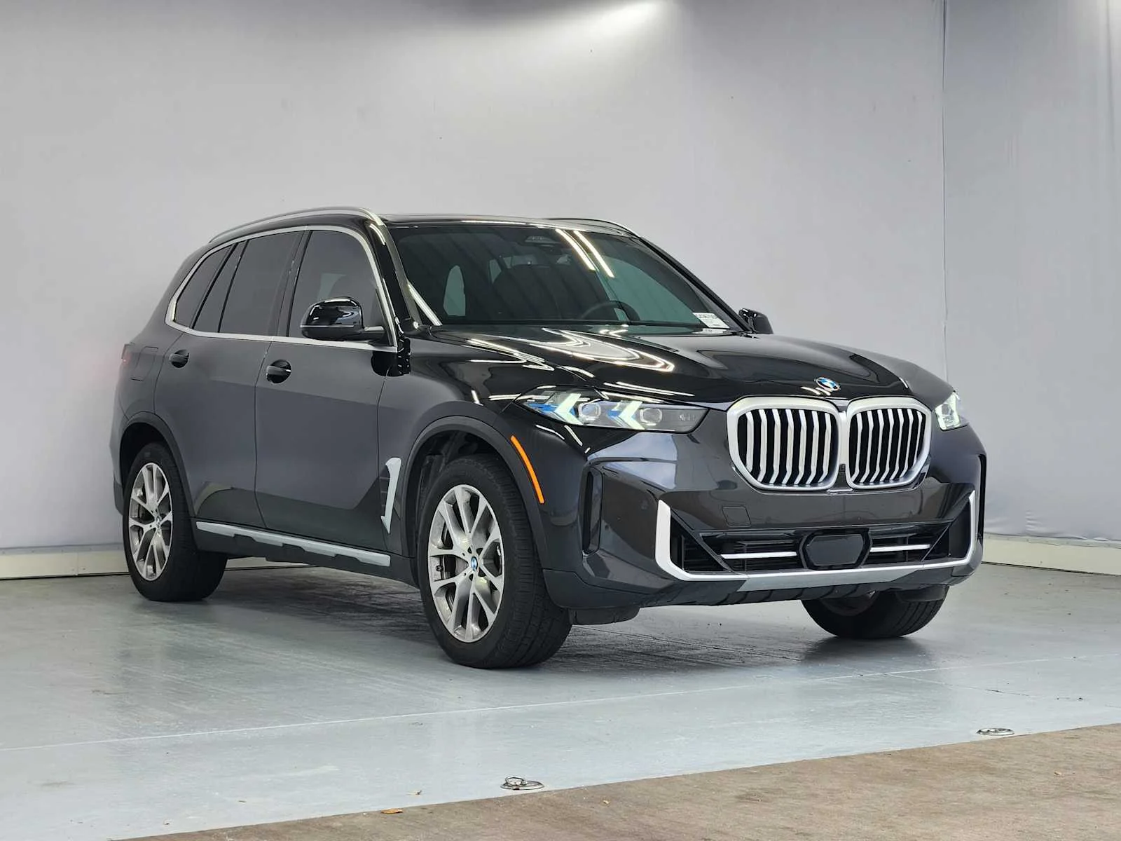 Certified Used 2024 Black Sapphire Metallic BMW xDrive40i image 2