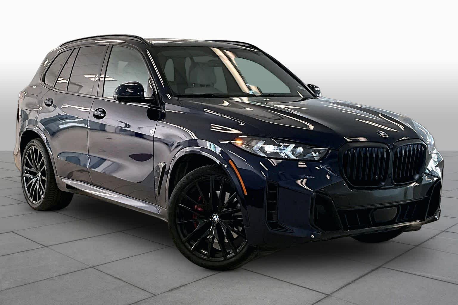 Used 2024 Tanzanite Blue II Metallic BMW sDrive40i image 2