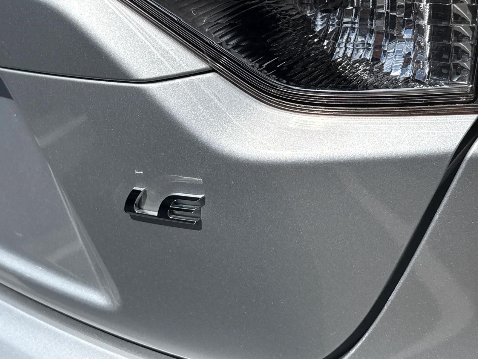 Used 2020 Classic Silver Metallic Toyota LE image 16