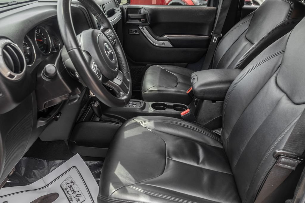 Used 2017 Black Jeep Unlimited Sahara image 14