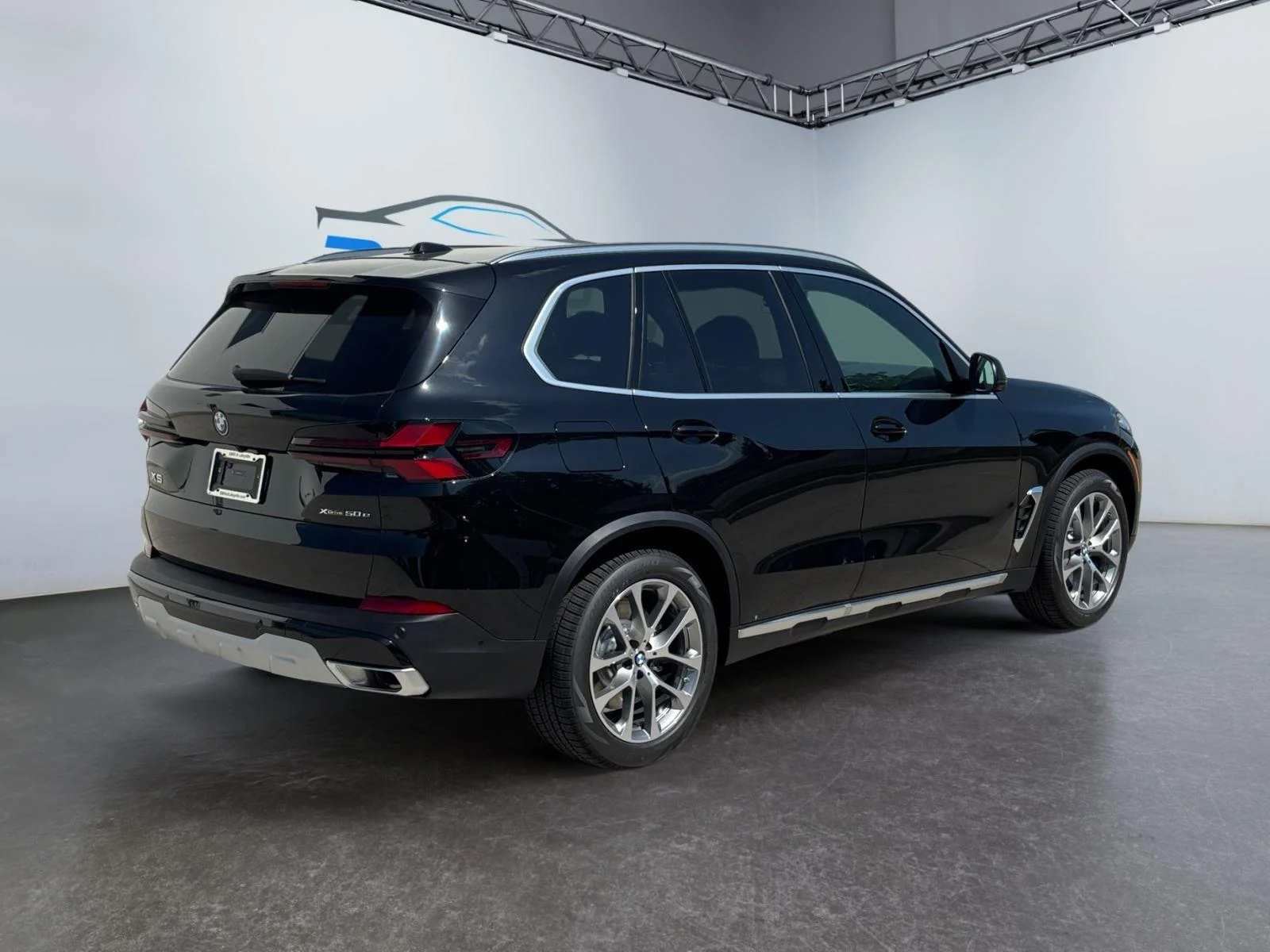New 2026 Black Sapphire Metallic BMW xDrive50e image 3
