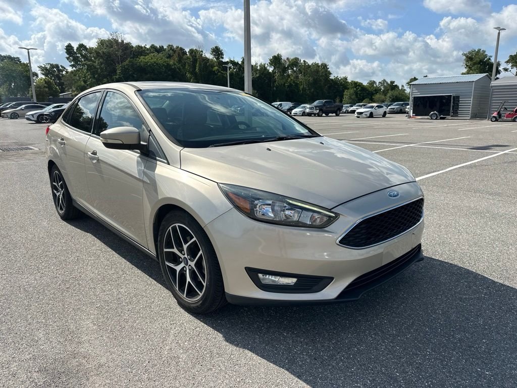 Used 2017 Gold Ford SEL image 1