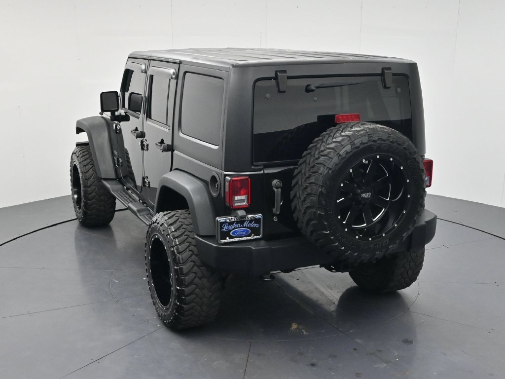 Used 2014 Black Clearcoat Jeep Unlimited Sport image 43