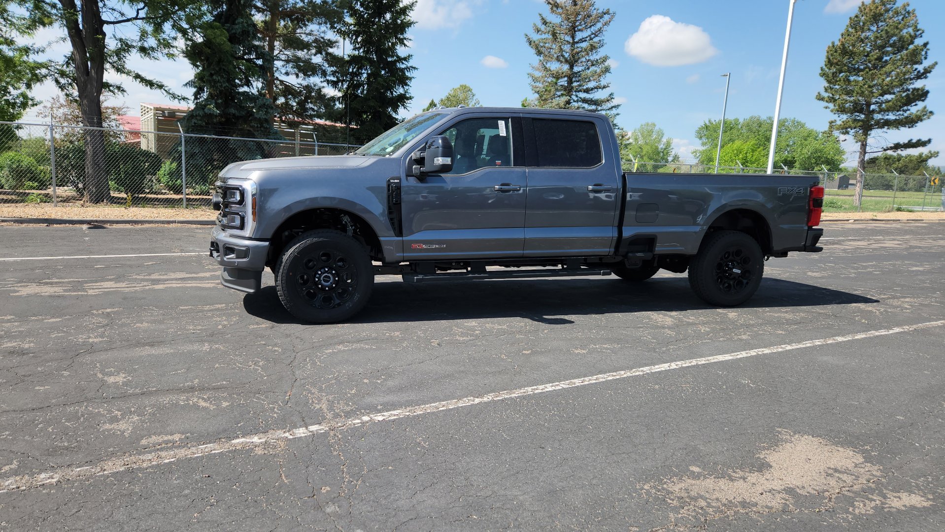 New 2026 Carbonized Gray Metallic Ford LARIAT image 5