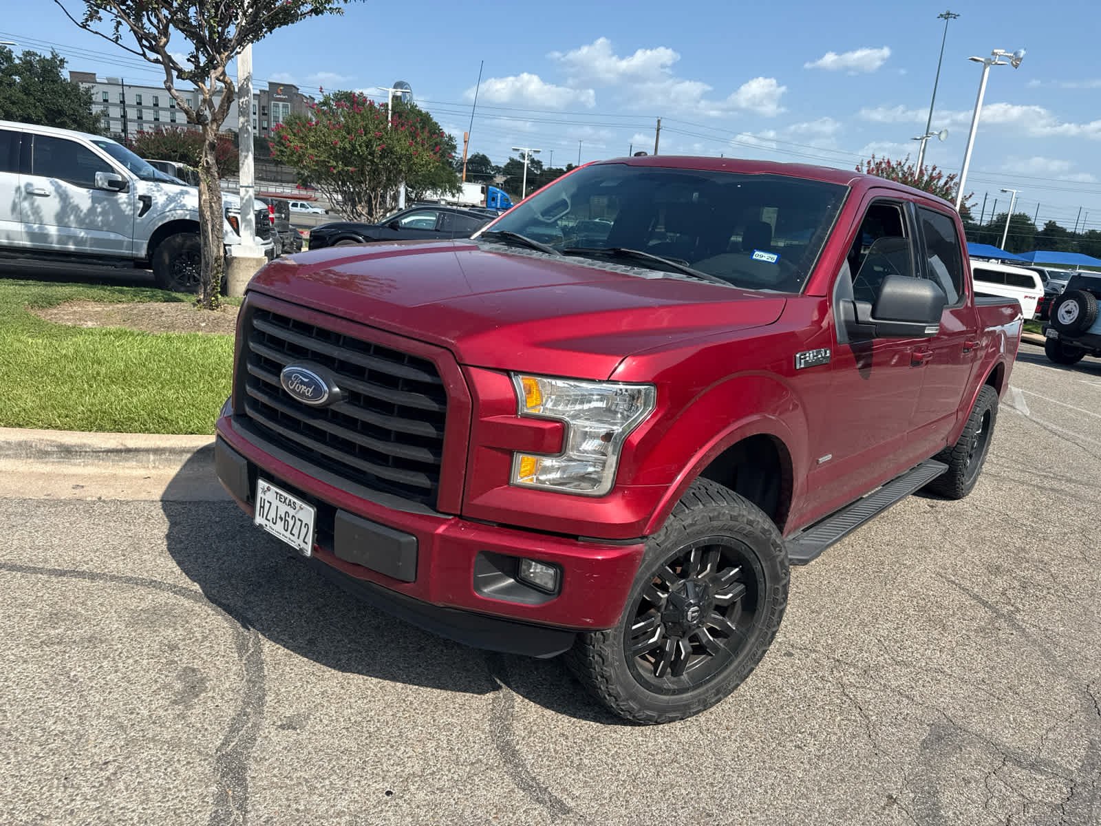 Used 2016 Ruby Red Metallic Tinted Clearcoat Ford XLT image 3