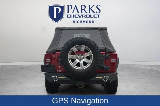 Used 2013 Red Jeep Unlimited Sahara image 7