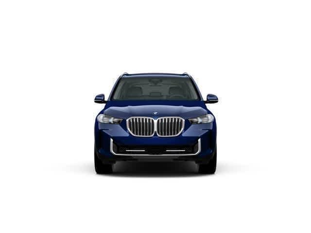 Used 2026 Tanzanite Blue II Metallic BMW sDrive40i image 2